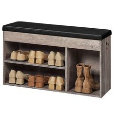 a wooden shoe rack with several pairs of shoes on it