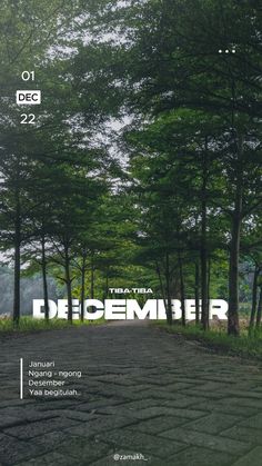 an advertisement for the upcoming film, dieember with trees in the background and cobblestone pavement