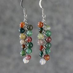 The chandelier earrings are handmade using semi-precious stone of Indian agate. The beauty of the agate is the sophisticated and playful color palette of moss green, earthy tan and brownish brown . They contrast each other, compliment each other. Each beads is one of a kind, uniquely designed by Mother Nature. The length of the earrings is 1 inches, 2.5cm. (excluding the length of hook) Chandelier earrings are airy, elegant and ultra-glam. Three dimensional chandelier will add fullness to your f Earrings Tassel, Stone Drop Earrings, Indian Agate, Earrings Handmade Dangle, Silver Earrings Handmade, Birthday Jewelry Gift, Vintage Elegant, Matching Necklaces, Bridesmaid Earrings