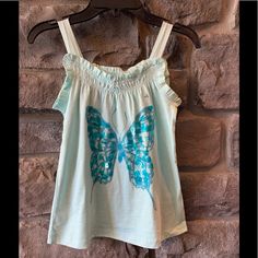 A New Beautiful Girl’s Top Gap Cotton Tops For Summer, Cute Gap Cotton T-shirt, Playful Summer Tops By Gap, Playful Summer Tops From Gap, Playful Gap Tops For Summer, Playful Gap Summer Tops, Cute Short Sleeve Gap Tops, Green Cotton Tops By Gap, Green Cotton Tops From Gap