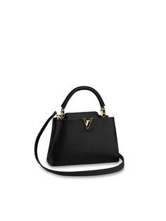 Gender: Women   Brand: LOUIS VUITTON   Product Name: Capucines BB Taurillon Leather Strap Tote Bag Black Gold   Bags Alora Code: 84194925   Color: black   Composition: Taurillon leather   Origin: Italy   Features:  Removable Strap Adjustable Strap Leather Handles    Designer Style ID M94755 Gold Couture, Gold Bags, Preppy Fashion, Louis Vuitton Capucines, Gold Bag, Tote Bag Black, Timeless Handbag, Designer Style, Leather Handles