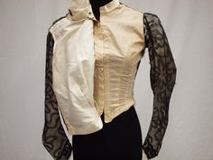 "This is a late 1890s bodice in excellent condition-- it's labeled inside as \"Paris 1899\". It exhibits high quality craftsmanship with bound seams and fine hand sewing. The inner lining is made of cotton and is extremely strong with no rips or tears and only one small brownish mark near the top. There are 7 stays for structure. A satin ribbon belt closes the waist with a hook and eye. The front closes with 16 hook and eyes, then the lace bodice crosses over and closes with it's own set of 8 ho Victorian Style Fitted Tops For Formal Occasions, Vintage Fitted Costume Blouse, Vintage Fitted Blouse For Costume, Fitted Vintage Costume Top, Vintage Fitted Top For Costumes, Elegant Fitted Costume Blouse, Elegant Fitted Blouse For Costume, Elegant Fitted Top For Costume, Fitted Victorian Blouse For Wedding