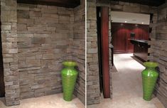 two green vases sitting in front of a stone wall next to an open door