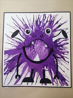 an art project with purple paint and black ink on white paper that looks like a monster