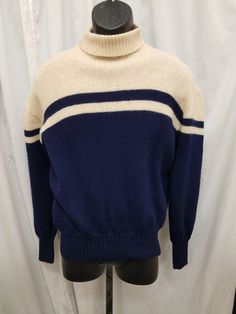 Vintage 1960's Cream Penney's Towncraft Turtleneck Pullover Thick Sweater Blue Striped Acrylic Long Sleeve Mod Rare! Large.  Top is in excellent condition (see pics)! Measurements: shoulder to shoulder 20 in, chest 40 in, sleeves 22, back of neck to bottom length 25, waist 22 stretch to 30 in. Retro Winter Tops With Ribbed Collar, Retro Tops With Ribbed Collar For Winter, Retro Winter Polo Sweater With Ribbed Collar, Retro Polo Sweater With Ribbed Collar For Winter, Vintage Crew Neck Outerwear For Winter, Cream Retro Winter Sweater, Vintage Wool Crew Neck Outerwear, Vintage Wool Outerwear With Crew Neck, Vintage Polo Sweater With Ribbed Collar