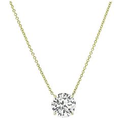 This is a charming 14k yellow gold pendant necklace. The necklace is set with sparkling round cut diamond that weighs approximately 3.31ct. The color of the diamond is I-J with VS2 clarity. The necklace measures 16 inches in length and weighs 3.1 grams. Diamond Gold Pendant, White Gold Pendant Necklace, Vintage Pendant Necklace, Diamond Bows, Solitaire Pendant Necklace, Bow Necklace, Round Necklace, Solitaire Pendant, Diamond Gold