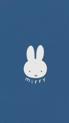 a blue background with a white rabbit face on it's chest and the word miffy written in large letters