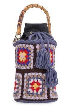 Elevate your style with our exquisite Crochet Bucket Bag. Crafted with 100% fabric and 100% wool, this luxurious bag features denim details, a drawstring closure, and a convenient internal flat pocket. The bamboo handle and gold-tone metal hardware add a touch of elegance, making it the perfect accessory for any fashion-forward individual. With a width of 18 cm, height of 36 cm, and depth of 18 cm, this bucket bag offers both style and functionality. Whether you're heading to a chic brunch or a Crochet Bucket Bag, Crochet Bucket, Chloe Purses, Bamboo Handles, Denim Details, Metal Hardware, Recycled Fabric, Playful Design, Gold Tone Metal