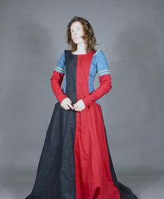 Two Colour Linen Medieval 14th Century Women's Over Coat Surcoat  Ladies would often dress up there kirtle by wearing and sucoat over the top witch could be styled simply or made lavishly with fur trims and fancy fabric.  We offer a simple style surcoat with a low hanging side openings which is made from your chosen coloured 100% linen fabrics colours in the pictures .  You can either choose the surcote to be lined on the inside in a cream cotton or have no lining witch is a cheaper option.  We Long Sleeve Medieval Dress For Costume Party In Fall, Medieval Long Sleeve Black Costume, Black Long Sleeve Medieval Costume, Black Long Sleeve Medieval Dress For Cosplay, Medieval Black Long Sleeve Costume, Black Long Sleeve Medieval Dress, Black Long Sleeve Medieval Dress For Fantasy Events, Fall Long Sleeve Larp Costume, Winter Long Sleeve Larp Costumes