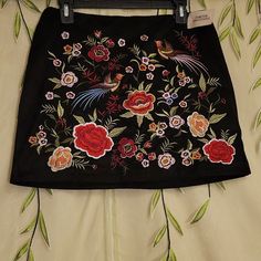 Forever21 Embroidered Suede Mini Skirt Size Large New With Tags!! Approximate Measurements: Waist: 16" Length: 16" Floral Embroidered Mini Skirt, Embroidered Black Mini Skirt For Spring, Black Lace Mini Skirt, Camo Mini Skirt, Red Flare, Blue Jean Skirt, Distressed Denim Skirt, Wool Mini Skirt, Faux Leather Mini Skirt