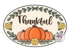 a round sign with the words,'grateful'and pumpkins in floral designs