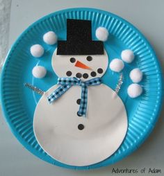 a paper plate with a snowman on it