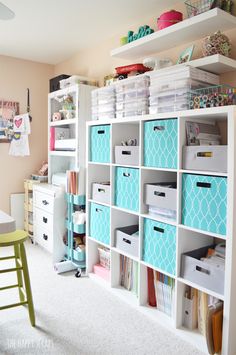 a room filled with lots of shelves and bins on top of eachother