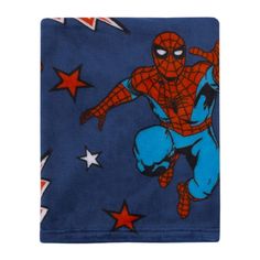 a blue towel with a spiderman on it and stars around the edges, in front of a white background