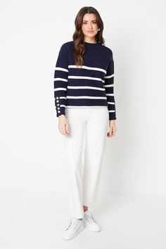 Crafted from knitted fabric for a soft and cosy feel
Striped pattern adds a touch of sophistication and visual interest
Button cuff detailing offers a refined finish
Relaxed fit allows for effortless layering and movement
Versatile design suitable for casual and smart-casual occasions
This striped sweater exudes a refined yet relaxed aesthetic, making it a versatile choice for the modern woman's wardrobe. The knitted fabric ensures a soft and comfortable wear, while the striped pattern and button cuff detailing add a touch of sophistication. With its relaxed fit, this sweater can be effortlessly layered or worn alone, making it suitable for casual family gatherings or smart-casual events. Style it with tailored trousers and loafers for a polished daytime look, or pair it with denim and t Jumper Outfit Women, Relaxed Aesthetic, Leather Jacket Dress, Work Wear Outfits, Floral Shirt Dress, Tshirt Skirt, Women's Wardrobe, Shirt Skirt, Striped Sweater