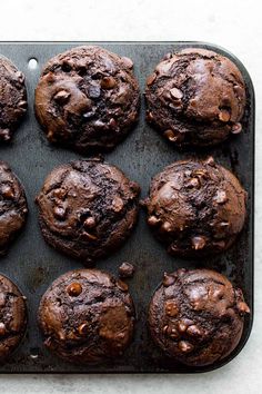 chocolate muffins on a baking tray ready to be eaten