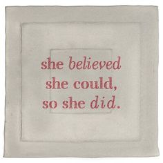 a white square with red writing on the front and back of it that says, she beliveed she could, so she did