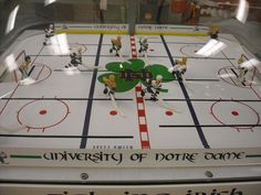 an ice hockey rink with several players on it and the words university of north carolina