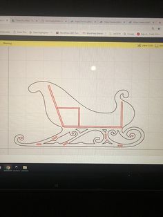 a computer screen with a drawing of a sleigh on it's side