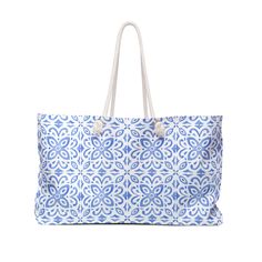 Our blue tile print Weekender Tote is perfect for your weekend at the beach or in town. The wide-mouthed, durable bag holds a generous amount of personal items and is easily held by its thick rope handles. .: One size: 24" x13" (60.9 cm x 33 cm) .: 100% Spun Polyester .: T-bottom .: Cream sheeting interior lining .: Size tolerance 0.75" (1.9 cm) Abstract Tote Bag, Floral Tote Bag, Blue Tile, Sac Week End, Thick Rope, Tile Print, Blue Beach, Blue Tiles, Weekender Tote