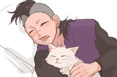 a man holding a white cat in his arms and sleeping on the floor with it's eyes closed