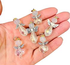 "crystal Angel random Wing charms Angel Wing Size: about 1\" long, hole: 4mm Color:mixed Gold & silver tone, clear AB Material: mixed Gold & silver alloy metal & faceted crystal Please Select Qty And color at drop box" White Dangle Charms For Jewelry Making, Silver Crystal Necklace With Gemstone Beads And Round Pendant, Silver Crystal Necklace With Gemstone Beads, Silver Crystal Necklace With Round Gemstone Pendant, Nickel-free Dangle Spiritual Charms, Nickel Free Dangle Spiritual Charms, Nickel-free Spiritual Dangle Charms, Nickel-free Round Bead Crystal Necklace Gift, Nickel-free Round Beaded Crystal Necklace Gift