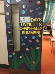 a door decorated to look like an aquarium with fish on it and under the water