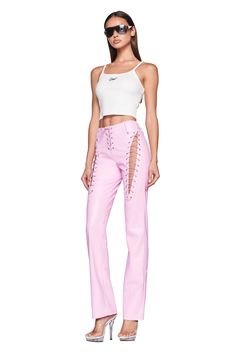 Details Best-selling Xenia Pant is back! Pink faux leather pant Mid to high rise fit Full length pant Bodycon fit to the knee that flares out at leg opening Belt loops around waist Button fly closure with true lace up ties Featuring lace-up detail at the front of the pant on the upper thigh of both legs and at the centre front Cut outs and adjustable lace up on thighs Lace up centre front closure Unlined - This fabric is not sheer Recommended Underwear: Due to the lace up detail around the thigh Pink Lace Up Pants, Pink Leather Outfit, Qveen Herby, Lace Up Leather Pants, Lace Up Jeans, Lace Up Pants, Concert Fit, Nashville Outfits, Pink Friday