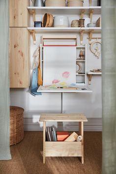 a kitchen with wooden cabinets and white walls