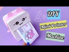 someone is making a paper toy that looks like a mini printer machine