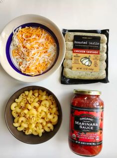 ingredients to make macaroni and cheese pasta laid out on a white counter top