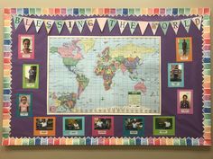 a colorful bulletin board with pictures and flags on it that says, yes we are the world