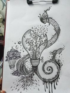 a drawing of a light bulb and flowers