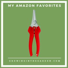 a pair of red scissors with the words, my amazon favorites growing in the garden com