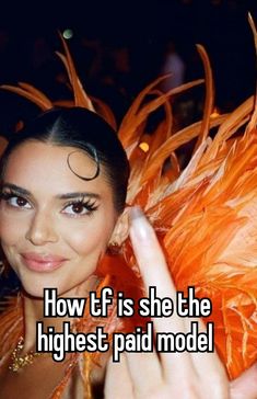 a woman in an orange feathered dress with the words how if is she the highest paid model?