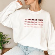 SHOPTAETOPIA.COM/ETSY-COUPON This Women in Tech sweatshirt is the perfect gift for techies, women who code, female engineers, developers, and more! ✔️ Unisex cut is flattering on both men and women ✔️ Soft and comfortable with reduced pilling from air-jet spun yarn ✔️ Printed on Gildan 18000 Unisex Sweatshirt Available in black, dark heather, sport grey, and white. ABOUT THE SWEATSHIRT: Printed on Gildan 18000 Unisex Sweatshirt, pre-shrunk fabric. Size guide included in images. PRINTING METHOD: Women Who Code, Winter Slogan T-shirt, Female Engineer, Gifts For Techies, Women In Tech, School Sweater, Engineer Shirt, Coding Shirts, Student Shirt