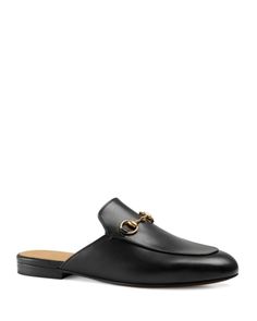 Gucci Women's Princetown Leather Mules Gucci Classic Mules With Leather Sole, Classic Gucci Mules With Leather Sole, Gucci Classic Leather Mules, Classic Gucci Leather Mules, Gucci Formal Mules With Leather Sole, Formal Gucci Mules With Leather Sole, Gucci Luxury Formal Mules, Luxury Gucci Mules For Formal Occasions, Gucci Designer Mules For Formal Occasions