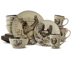 a group of plates and cups with roosters on them, all in black and white