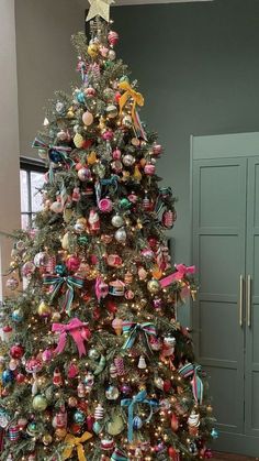 a decorated christmas tree in a room