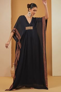 Black floor length kaftan with printed border and embroidered panel. Paired with a pant and separate inner. - Aza Fashions Black Floor-length Kaftan For Festive Occasions, Black Maxi Length Kaftan With Dabka, Bollywood Style Black Kaftan With Dabka, Black Bollywood Kaftan With Dabka, Black Kaftan For Festive Occasions And Festivals, Black Festive Kaftan For Festivals, Black Embroidered Bollywood Kaftan, Embroidered Black Kaftan Bollywood Style, Bollywood Style Embroidered Black Kaftan