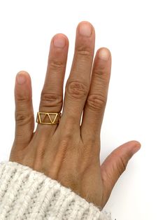 Gold Triangle Ring made of Gold Vermeil: 18k Gold over Solid 925 Sterling Silver ☞ made to last.Matching Earrings & Pendant - please ask me Details: • Minimalist Triangle Ring • Dimensions: Band width ≈ 9mm, thickness ≈ 1mm • 18k Gold Vermeil SKU R1010010335 Minimalist Geometric Rings For Gifts, Everyday Symbolic Yellow Gold Rings, Unique Geometric Rings For Gifts, Adjustable Geometric Rings For Gifts, Adjustable Geometric Rings As Gift, Minimalist Triangle Jewelry For Anniversary, Gold Triangle Jewelry For Anniversary, Sterling Silver Triangle Rings For Gifts, Sterling Silver Triangle Rings As Gift