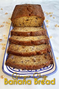 a loaf of banana bread sitting on top of a blue and white plate