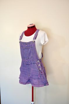 Item# 220643 I have been dying denim regularly - I just started dying other items like these overalls.  They have been a big hit! This item listing is the actual garment pictured. It is a vintage pair of bib overalls that I have dyed. It is ready to ship! ABOUT OVERALLS: Overalls are loose fitting. The waist measurement is about 1-2 inches larger than what you would normally wear.  Adult Small 32-34" waist.  Medium 34-36" waist,  Large 36-38" waist  XL  38-44" waist.  2XL  46-48" Waist 3XL 50-52" Waist DETAILS: Upcycled Cotton Overalls "No Boundaries" Brand 99% Cotton/1%Spandex Dyed Pink Bib Overall Shorts - elastic waist band along the back Size 3/5 Small Measurements:   Size Jrs. Small 30" Waistline  38" Hips 3" inseam (length of the legs from crotch to hem) 28" Rise (length from the sho Cotton Overalls, Bib Overalls, Overalls Women, Short En Jean, How To Dye Fabric, Overall Shorts, Overalls, Tie Dye, Loose Fitting