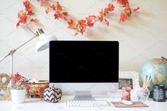 a desktop computer sitting on top of a white desk