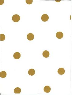 a white and gold polka dot paper with brown dots on it