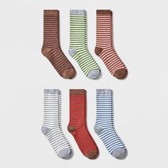 Gift your sock drawer a cool, comfy update with these Women's Striped 6pk Crew Socks - A New Day™ Assorted Colors 4-10. This pack of socks comes with six pairs — featuring stripe patterns, giving you stylish options to coordinate with a range of looks. They're made from a soft fabric with a touch of spandex for comfortable wear, while the fully elastic trims offer the perfect fit. Simply pair them with sneakers, boots and more to add a cool twist to your look. A New Day™: Style that goes whereve A New Day Target, Stripe Socks, Holiday Socks, Funky Socks, Fun Socks, Sock Drawer, Sock Packs, Sneakers For Women, Striped Socks