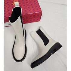 ad eBay - Tory Burch Women's Sz. 8 Benton Vachetta Calf Boots In Ivory/Black NIB LEATHER UPPER LEATHER LINING GOLD-TONE HARDWARE WITH LOGO ACCENT PULL ON TAB ELASTICIZED SLIP-ON STYLE LIGHTLY PADDED FOOTBED LUG SOLE 1.5" HEEL 1"PLATFORM 8" SHAFT 11" BOOT CIRCUMFERENCE Features: • Benton Vachetta Calf boots Size: Womens 8 Condition: New With Box Brand new with the box. Smoke free, pet free home. Calf Boots, Lug Sole, Boot Shoes Women, Women's Shoes, Tory Burch, Womens Boots, Leather Upper, Shoe Boots, Slip On