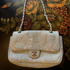 A Very Unique Chanel Bag Made With Swarovski Crystals On The Front And Both Sides. There Is A Pocket On The Back. It Is In Very Good Condition, However, Please See The Photograph Of Spots On The Interior This Is A Gorgeous Bag. I Purchased It From An Estate Sale That Did Authenticate The Bag And Have Only Admired It In My Purse Case. I Have Lowered The Price A Few Times And Cannot Accept Any Offers On This Item. Thank You For Looking. Designer Bags With Rhinestones For Everyday Use, Designer Embellished Bags For Shopping, Designer Leather Shoulder Bag With Rhinestones, Luxury Rhinestone Bags For Shopping, Chanel Sequin Bag, Gorgeous Bags, Chanel Handbags, Chanel Bag, Bag Making