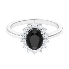 Product Details Youll adore the timeless design of this Princess Diana inspired ring, featuring an oval-shaped Black Onyx as the main stone and a halo of round Diamond. This Black Onyx Ring emanates a luxurious look. Product Information SKU SHP-RINGS0821231760 Width 4 mm Height 11 mm Weight 2.56 gm (Approximate) BLACK ONYX INFORMATION No.of Stones 1 Pieces Total Weight 1.10 Carat (Approximate) Dimension(approx) Oval-6X8 mm-1 Pcs Color Black Cut Brilliant Shape Oval Setting Type Prong-Setting Qua Diana Ring, Black Onyx Engagement Ring, Oval Setting, Onyx Engagement Ring, Black Engagement Ring, Engagement Ring Diamond, Black Onyx Ring, 18k Yellow Gold Ring, Onyx Ring