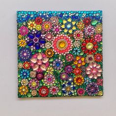 a colorful painting with lots of flowers on it